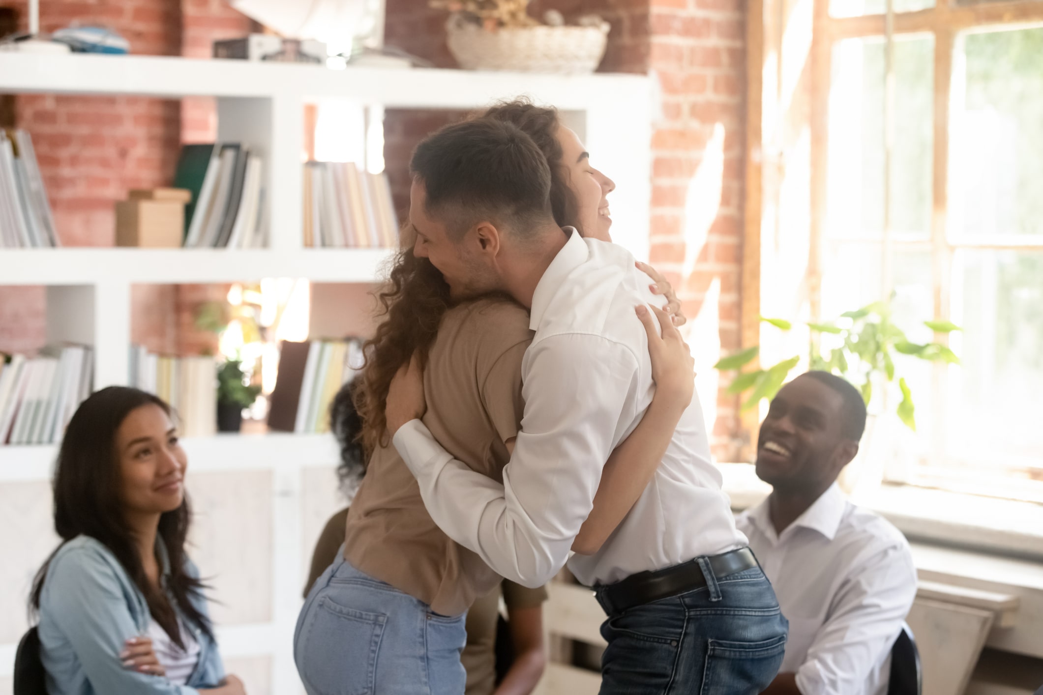 Women hugging each other