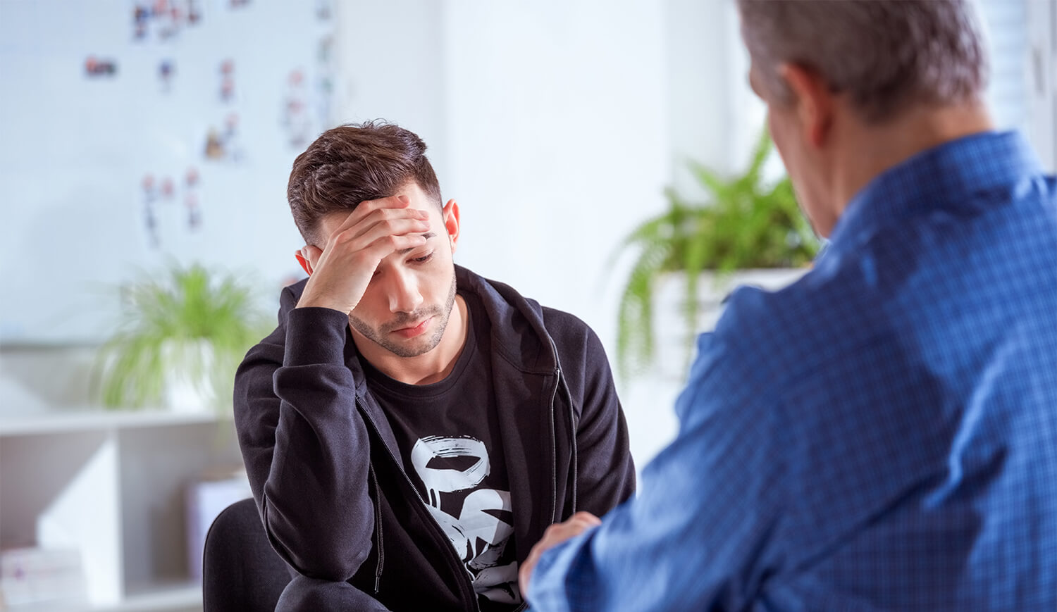 Man in a meeting with his therapist