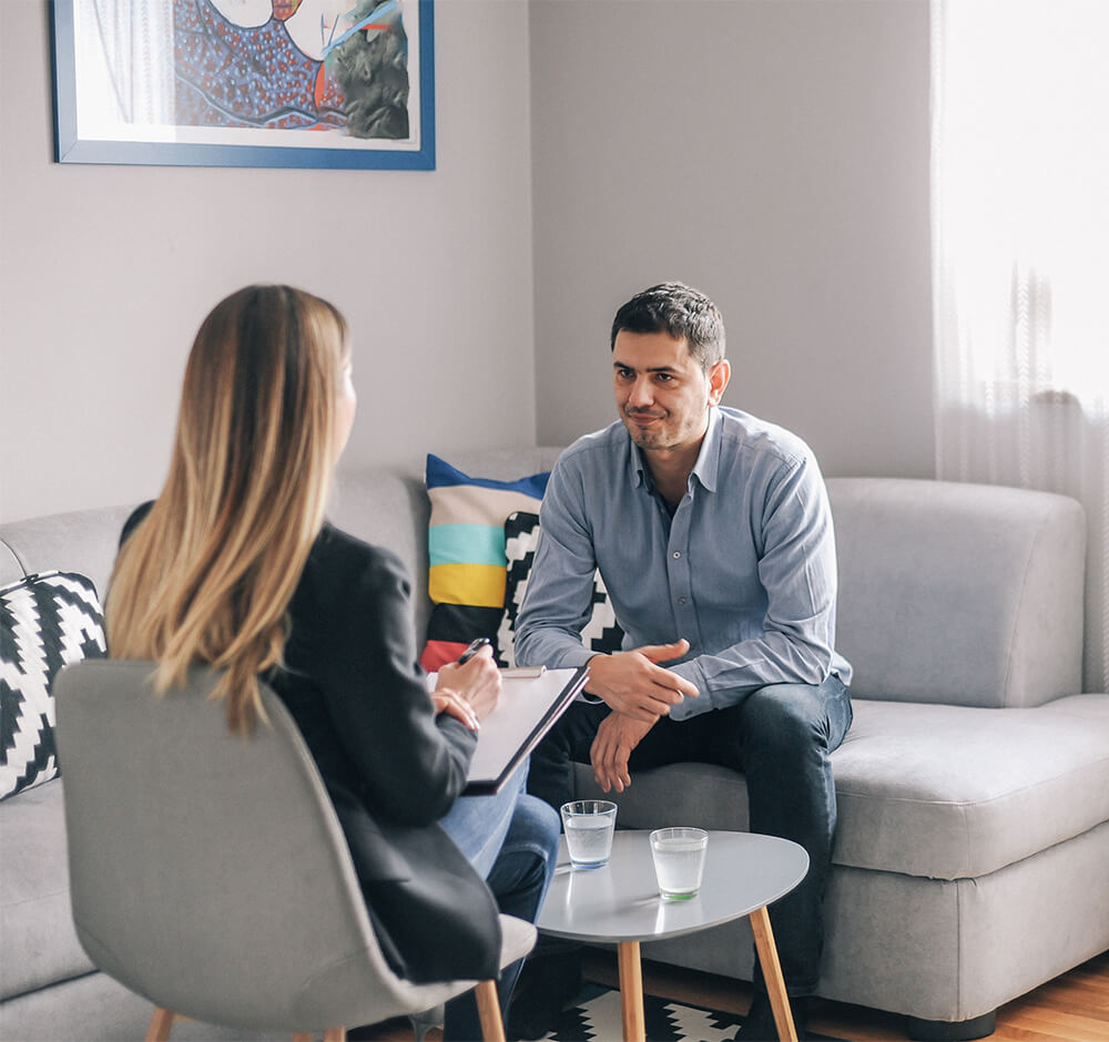 Man listening to his therapist