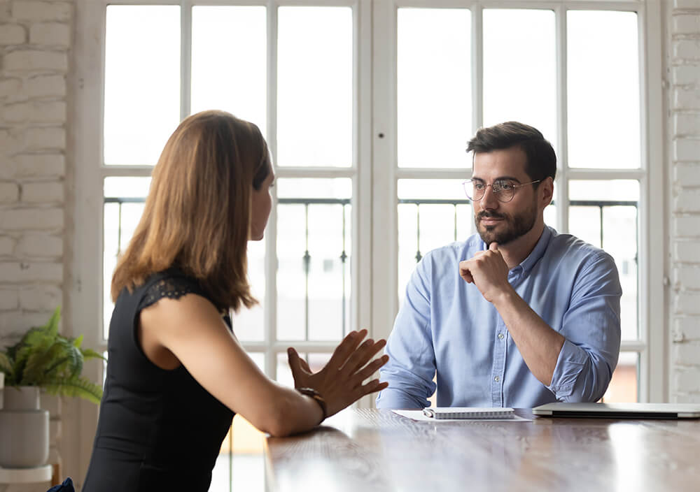 Therapist listening to his patient