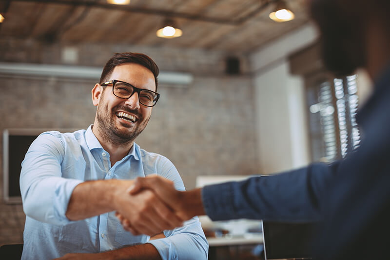 Two men shaking hands